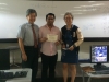 Dr. Ho and Dr. Rodrigo posing with participants during certificate awarding.