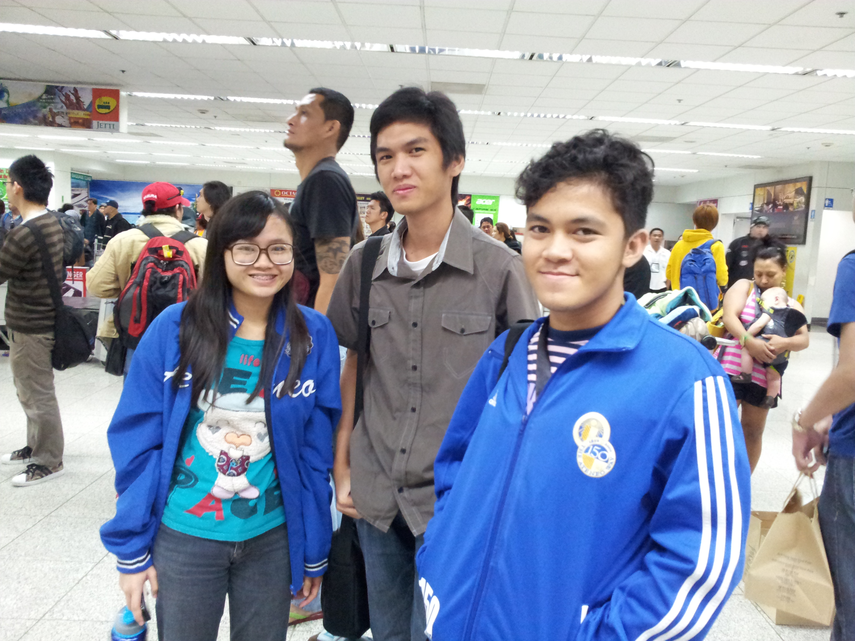 Erica, Marlou, and Nicko in the Davao airport